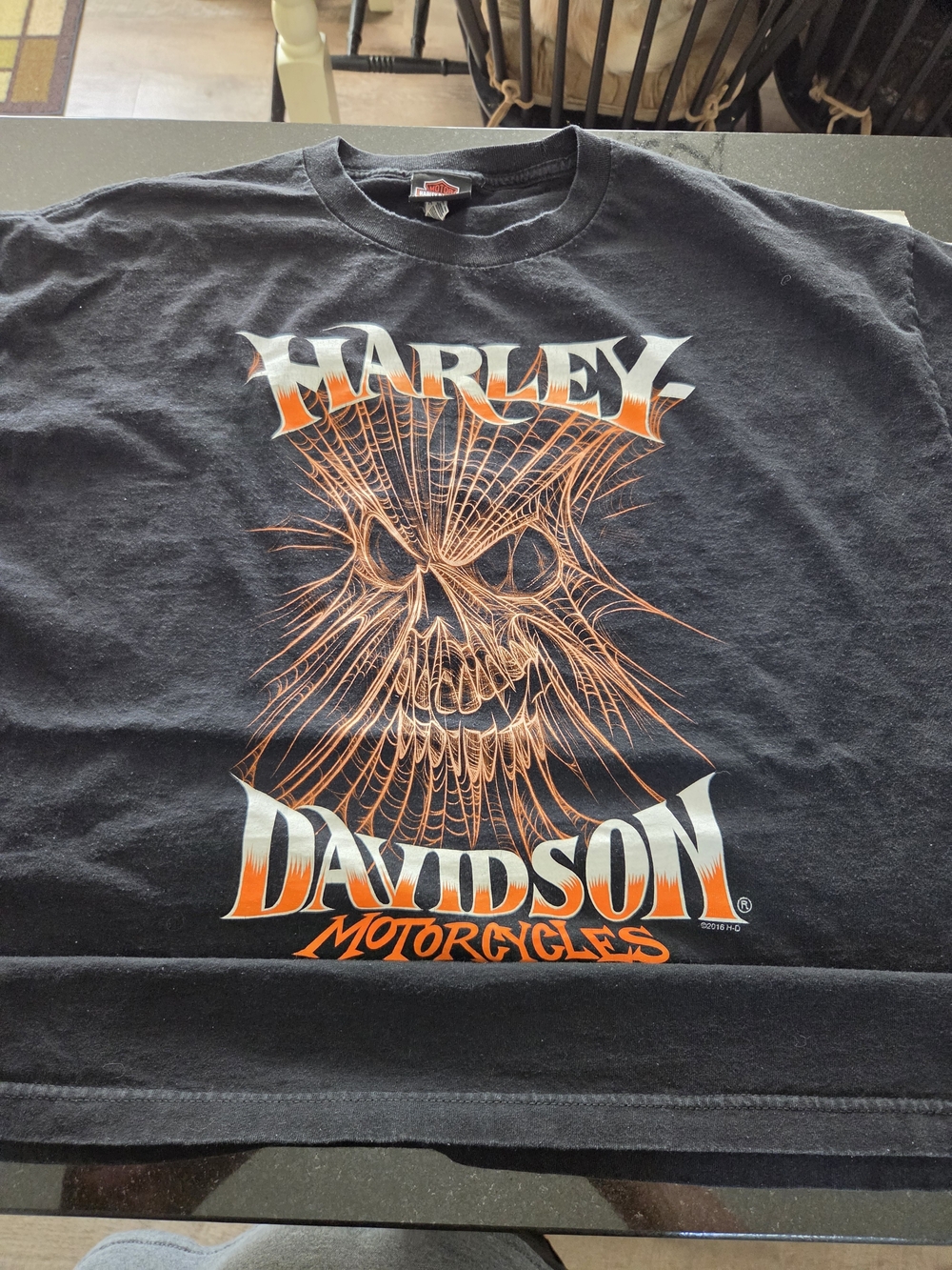 Harley-Davidson Black Tee with Orange and White Skull Graphic